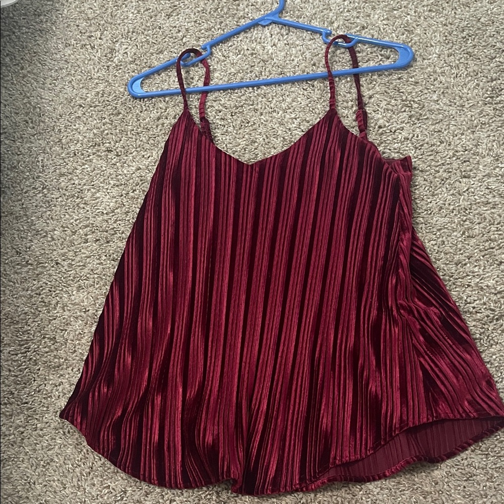Woman’s red top.